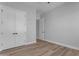 Simple bedroom with wood floors and double door closet at 26761 S 181St Pl, Queen Creek, AZ 85142