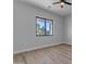 Bright bedroom with hardwood floors and large window at 26615 S 181St Pl, Queen Creek, AZ 85142