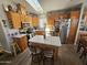 Modern kitchen with wood cabinets, stainless steel appliances, and a large island at 650 N Hawes Rd # 4507, Mesa, AZ 85207