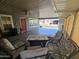 Spacious covered patio with seating and outdoor fan at 650 N Hawes Rd # 4507, Mesa, AZ 85207