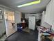 Laundry room with washer, dryer, storage cabinets, and refrigerator at 650 N Hawes Rd # 4507, Mesa, AZ 85207