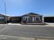 Gray house with a covered carport and red door at 650 N Hawes Rd # 4507, Mesa, AZ 85207