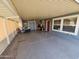 Large covered patio with seating area and access to interior at 650 N Hawes Rd # 4507, Mesa, AZ 85207