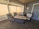 Relaxing covered patio furnished with wicker seating at 650 N Hawes Rd # 4507, Mesa, AZ 85207