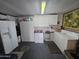 Bright laundry room with washer, dryer, and ample storage at 650 N Hawes Rd # 4507, Mesa, AZ 85207