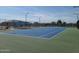 Well-lit tennis court, perfect for recreational play at 650 N Hawes Rd # 4507, Mesa, AZ 85207