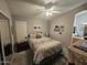 Spacious bedroom with mirrored closet doors and neutral decor at 650 N Hawes Rd # 4507, Mesa, AZ 85207
