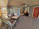 Covered patio with seating and a TV at 650 N Hawes Rd # 4507, Mesa, AZ 85207
