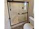Clean bathroom with a large walk-in shower and neutral tile at 650 N Hawes Rd # 4507, Mesa, AZ 85207