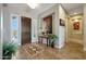 Spacious entryway with tile floors, a console table, and artwork at 12349 W Tyler Trl, Peoria, AZ 85383