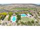 Aerial view of community pool, tennis courts, and playground at 12349 W Tyler Trl, Peoria, AZ 85383