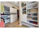 Large walk-in closet with ample shelving and hanging space at 12349 W Tyler Trl, Peoria, AZ 85383