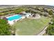 Community lap pool, playground, and grassy area at 12349 W Tyler Trl, Peoria, AZ 85383