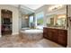 Elegant bathroom with soaking tub, walk-in shower, and double vanity at 12349 W Tyler Trl, Peoria, AZ 85383