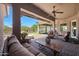 Covered patio with seating area, perfect for outdoor entertaining at 12349 W Tyler Trl, Peoria, AZ 85383