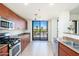 Well-equipped kitchen featuring wood cabinets and gas range at 2302 N Central N Ave # 302, Phoenix, AZ 85004