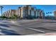 Daytime view of an apartment building near a street intersection at 2302 N Central N Ave # 302, Phoenix, AZ 85004