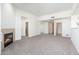 Open living space with a fireplace and access to other rooms at 2302 N Central N Ave # 302, Phoenix, AZ 85004