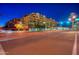 Night view of a modern apartment building with city lights at 2302 N Central N Ave # 302, Phoenix, AZ 85004