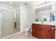 Bathroom with shower, toilet and wood vanity at 2302 N Central N Ave # 302, Phoenix, AZ 85004