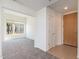 Bright entryway with tile flooring and view into the living area at 2302 N Central N Ave # 302, Phoenix, AZ 85004