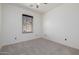 Bright bedroom with carpeted floor and window blinds at 2127 E Huntington Dr, Phoenix, AZ 85040