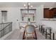 Charming dining room with a round table and four chairs, offering a bright and airy feel at 2127 E Huntington Dr, Phoenix, AZ 85040