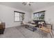 Bright living room with comfy seating, large windows, and a cozy atmosphere at 2127 E Huntington Dr, Phoenix, AZ 85040