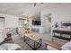 Open living room with adjacent kitchen and dining area, perfect for entertaining at 2127 E Huntington Dr, Phoenix, AZ 85040