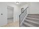 Interior view of a carpeted staircase and hallway at 2127 E Huntington Dr, Phoenix, AZ 85040