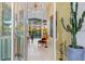 Bright entryway with mid-century modern decor and views to the backyard at 8517 N 48Th Pl, Paradise Valley, AZ 85253