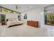 Spacious main bedroom with large windows, and access to a private patio at 8517 N 48Th Pl, Paradise Valley, AZ 85253