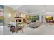 Open living room with a fireplace and access to multiple areas of the home at 8517 N 48Th Pl, Paradise Valley, AZ 85253