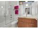 Modern bathroom with a glass shower, toilet and wood vanity at 8517 N 48Th Pl, Paradise Valley, AZ 85253