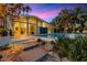 Stunning pool and patio area with mountain views at sunset at 8517 N 48Th Pl, Paradise Valley, AZ 85253
