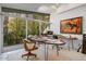 Home office with large window, providing natural light and garden views at 8517 N 48Th Pl, Paradise Valley, AZ 85253