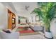 Main bedroom with sitting area and access to private patio and pool views at 8517 N 48Th Pl, Paradise Valley, AZ 85253