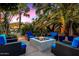 Relaxing patio with fire pit and comfortable seating at 8517 N 48Th Pl, Paradise Valley, AZ 85253