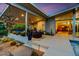Modern patio with seating area and view into home at 8517 N 48Th Pl, Paradise Valley, AZ 85253