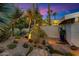 Landscaped front yard features drought-tolerant plants and a tranquil pathway to the home at 8517 N 48Th Pl, Paradise Valley, AZ 85253