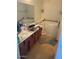Main bathroom with walk-in shower and double vanity at 46157 W Holly Dr, Maricopa, AZ 85139