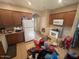 Kitchen features ample cabinetry and a view to the hallway at 46157 W Holly Dr, Maricopa, AZ 85139