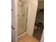 Bathroom with shower and access to closet at 46157 W Holly Dr, Maricopa, AZ 85139