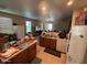 Open kitchen with island and appliances, overlooking the living area at 46157 W Holly Dr, Maricopa, AZ 85139