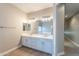 Double vanity bathroom with modern finishes and mirror at 3802 N 147Th Dr, Goodyear, AZ 85395