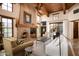 Bright living room with a fireplace and lots of natural light at 38749 N 104Th Way, Scottsdale, AZ 85262