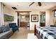 Bedroom with built-in kitchenette and sitting area at 38749 N 104Th Way, Scottsdale, AZ 85262