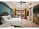 Main bedroom with private access to backyard, and ample natural light at 38749 N 104Th Way, Scottsdale, AZ 85262