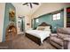 Relaxing main bedroom with fireplace, built-in shelving, and seating area at 38749 N 104Th Way, Scottsdale, AZ 85262