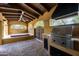 Outdoor kitchen with grill, built-in appliances, and hot tub at 38749 N 104Th Way, Scottsdale, AZ 85262